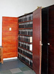 Entomological boxes stored in a cupboard
